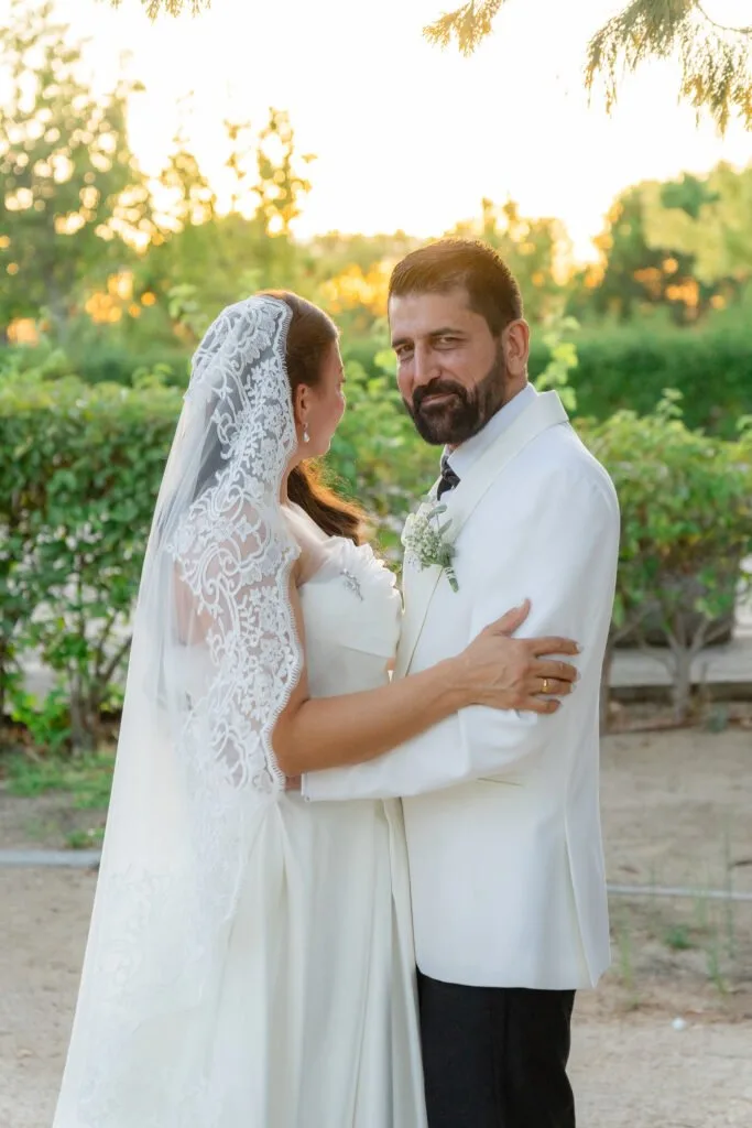 The couple laughing in the last light of the day