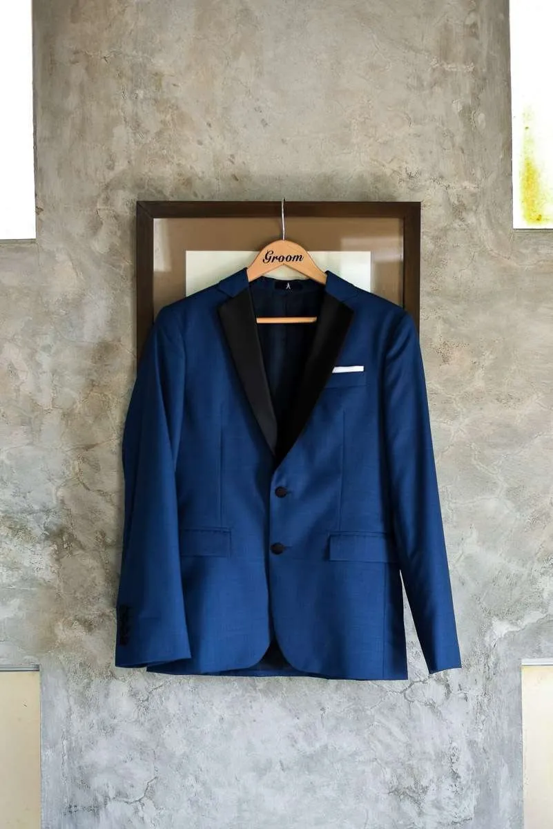 Blue jacket hanging on a hanger