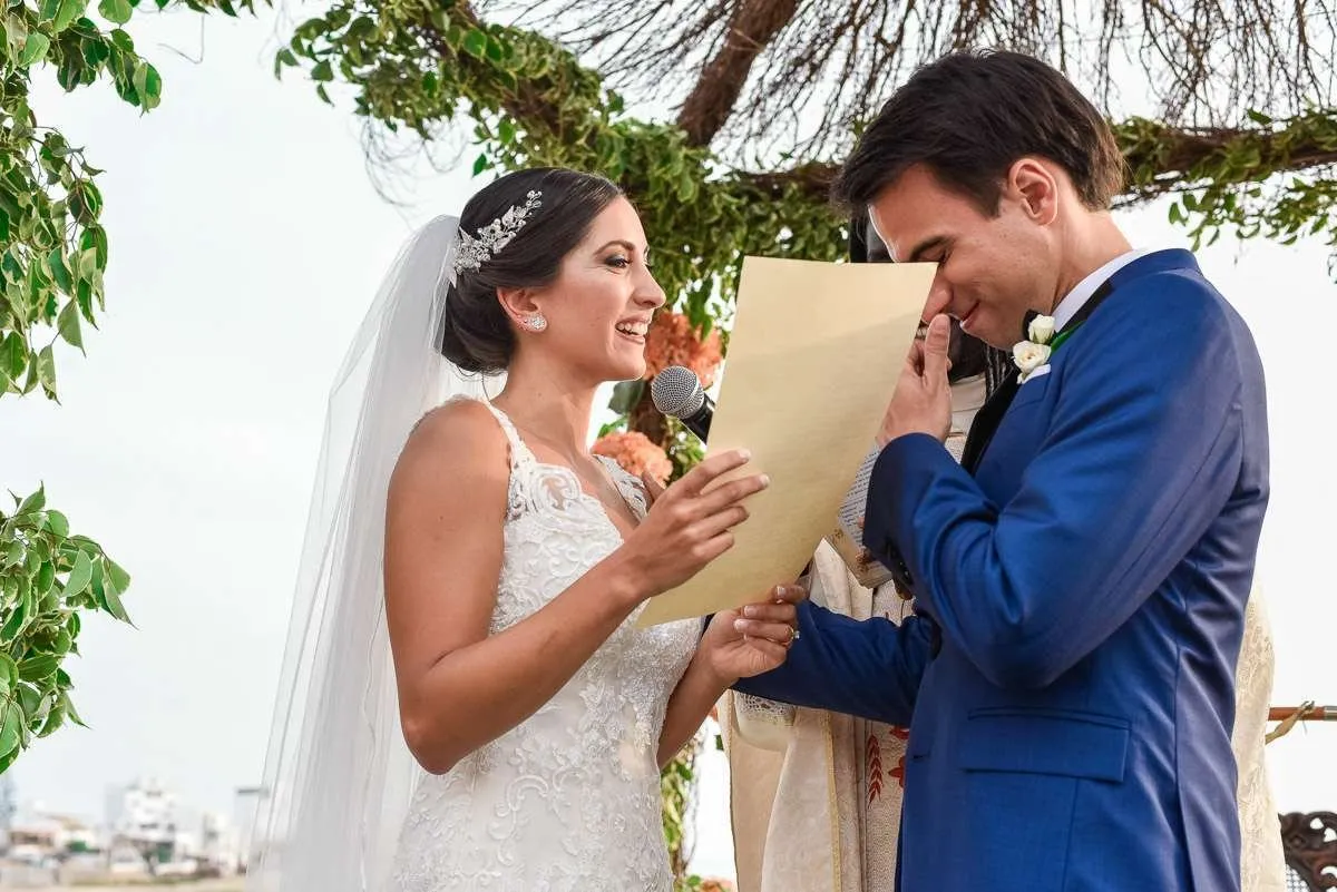 Couple reading a paper during the ceremony